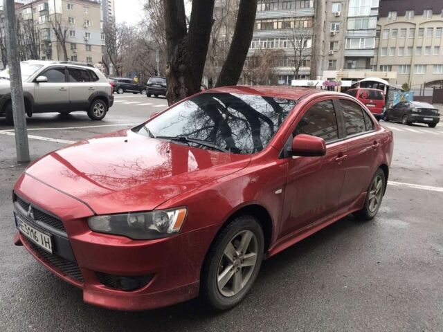 Червоний Міцубісі Lancer, об'ємом двигуна 2 л та пробігом 199 тис. км за 7900 $, фото 1 на Automoto.ua