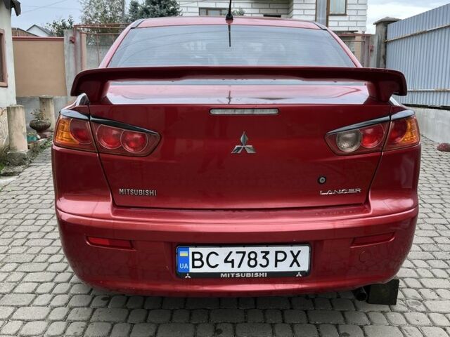 Красный Мицубиси Лансер, объемом двигателя 1.5 л и пробегом 290 тыс. км за 4500 $, фото 1 на Automoto.ua