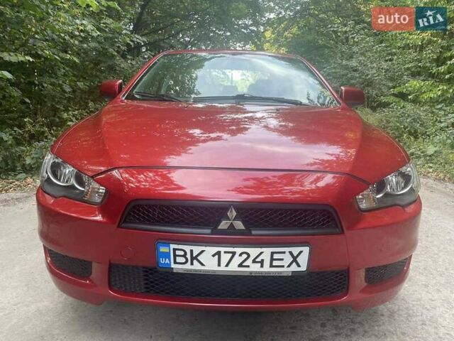 Красный Мицубиси Лансер, объемом двигателя 1.5 л и пробегом 124 тыс. км за 7100 $, фото 1 на Automoto.ua