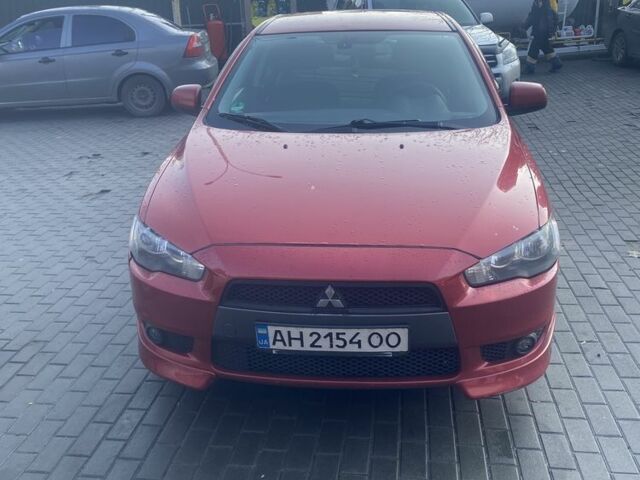 Червоний Міцубісі Lancer, об'ємом двигуна 2 л та пробігом 200 тис. км за 5350 $, фото 1 на Automoto.ua
