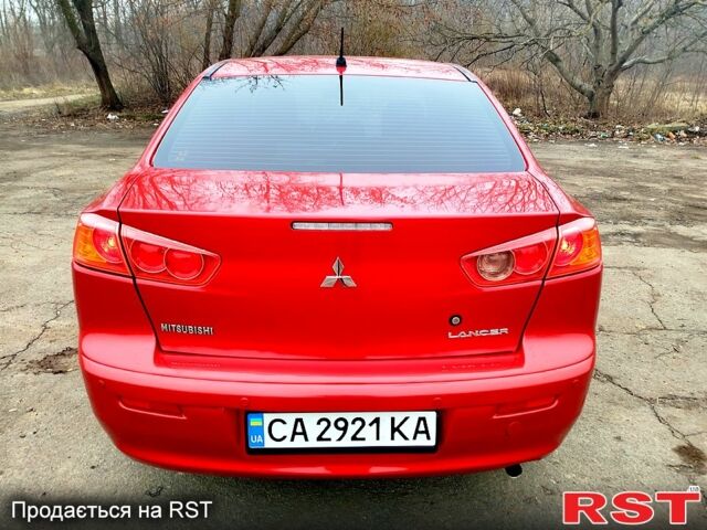 Красный Мицубиси Лансер, объемом двигателя 1.5 л и пробегом 99 тыс. км за 6900 $, фото 1 на Automoto.ua