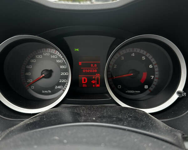 Красный Мицубиси Лансер, объемом двигателя 2 л и пробегом 92 тыс. км за 6500 $, фото 1 на Automoto.ua