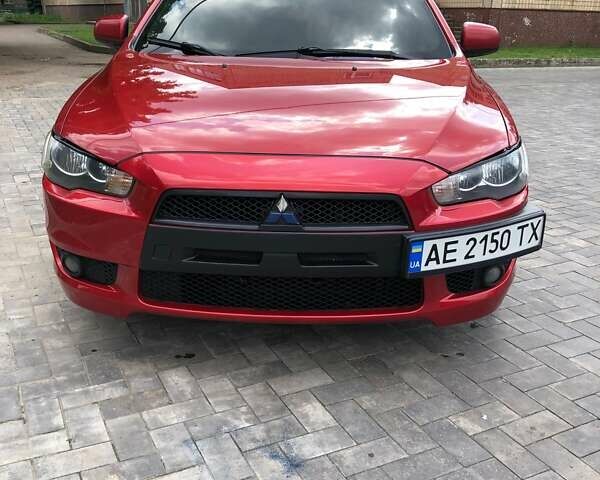 Червоний Міцубісі Lancer, об'ємом двигуна 2 л та пробігом 173 тис. км за 7400 $, фото 1 на Automoto.ua