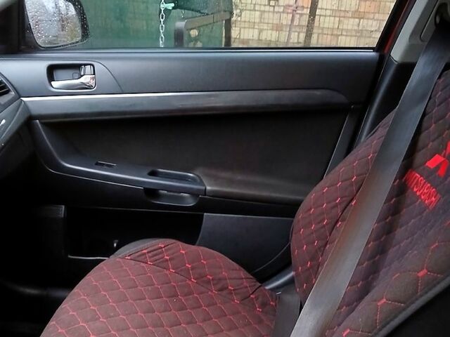 Червоний Міцубісі Lancer, об'ємом двигуна 2 л та пробігом 228 тис. км за 6500 $, фото 1 на Automoto.ua