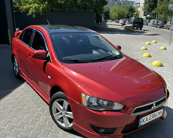 Мицубиси Лансер 2009 в Киеве на Automoto.ua Красный Мицубиси Лансер, объемом двигателя 2 л и пробегом 251 тыс. км за 6999 $, фото 1 на Automoto.ua