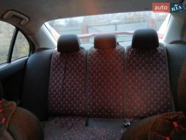 Червоний Міцубісі Lancer, об'ємом двигуна 2 л та пробігом 228 тис. км за 6200 $, фото 1 на Automoto.ua