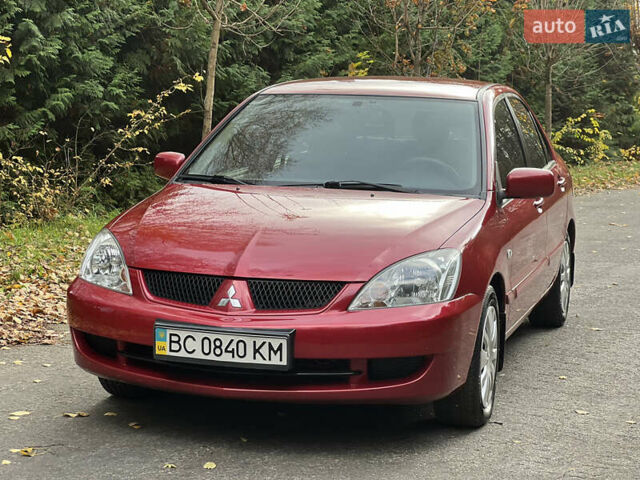 Міцубісі Lancer 2009 у Вінниці на Automoto.ua Червоний Міцубісі Lancer, об'ємом двигуна 1.58 л та пробігом 133 тис. км за 6750 $, фото 1 на Automoto.ua