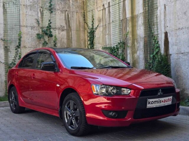 Червоний Міцубісі Lancer, об'ємом двигуна 2 л та пробігом 100 тис. км за 6999 $, фото 1 на Automoto.ua