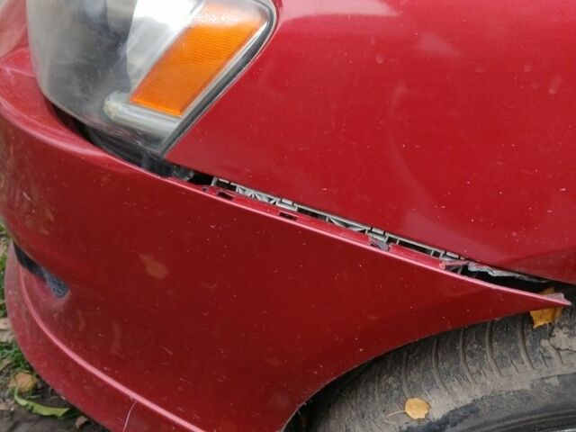 Червоний Міцубісі Lancer, об'ємом двигуна 2 л та пробігом 2 тис. км за 6200 $, фото 1 на Automoto.ua