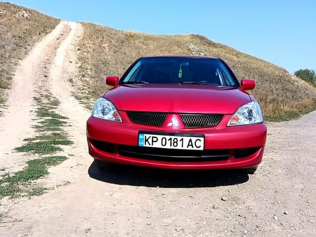 Червоний Міцубісі Lancer, об'ємом двигуна 1.6 л та пробігом 0 тис. км за 5500 $, фото 1 на Automoto.ua