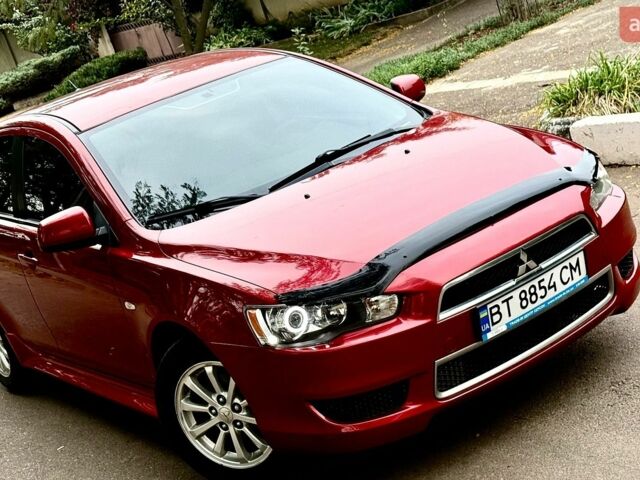 Червоний Міцубісі Lancer, об'ємом двигуна 2.36 л та пробігом 167 тис. км за 6700 $, фото 1 на Automoto.ua