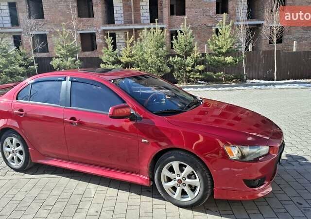 Червоний Міцубісі Lancer, об'ємом двигуна 1.8 л та пробігом 115 тис. км за 10300 $, фото 1 на Automoto.ua