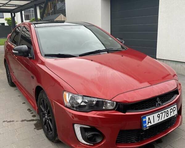 Червоний Міцубісі Lancer, об'ємом двигуна 2 л та пробігом 90 тис. км за 9490 $, фото 1 на Automoto.ua