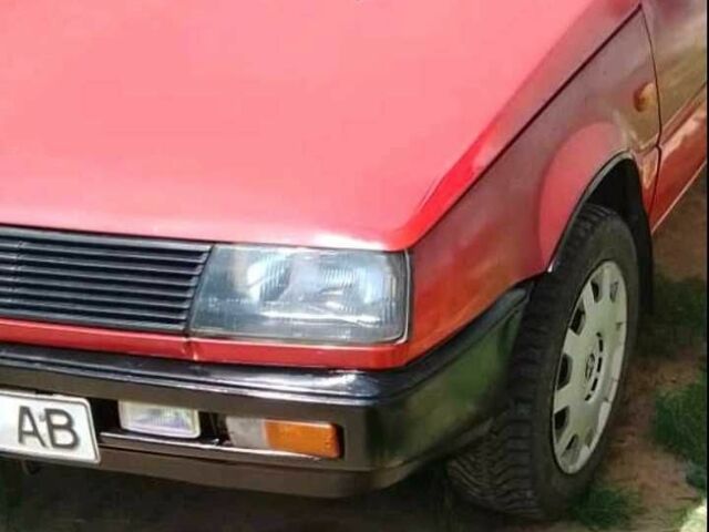 Красный Мицубиси Лансер, объемом двигателя 1.8 л и пробегом 2 тыс. км за 1250 $, фото 1 на Automoto.ua