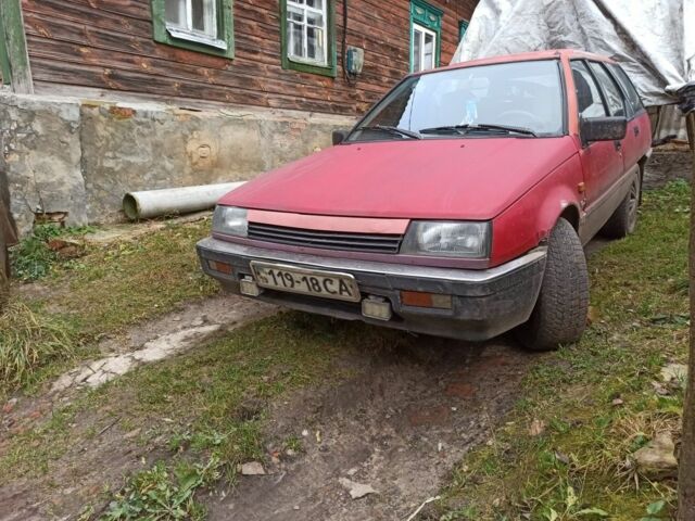 Красный Мицубиси Лансер, объемом двигателя 1.8 л и пробегом 250 тыс. км за 700 $, фото 1 на Automoto.ua