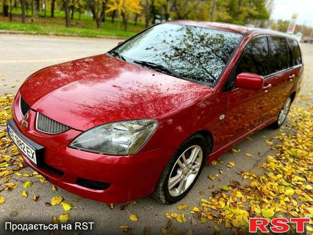 Червоний Міцубісі Lancer, об'ємом двигуна 1.6 л та пробігом 214 тис. км за 3999 $, фото 1 на Automoto.ua