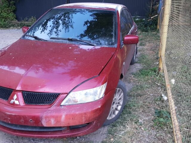 Червоний Міцубісі Lancer, об'ємом двигуна 1.6 л та пробігом 333 тис. км за 1800 $, фото 1 на Automoto.ua