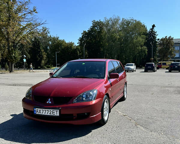 Червоний Міцубісі Lancer, об'ємом двигуна 1.6 л та пробігом 244 тис. км за 3900 $, фото 1 на Automoto.ua