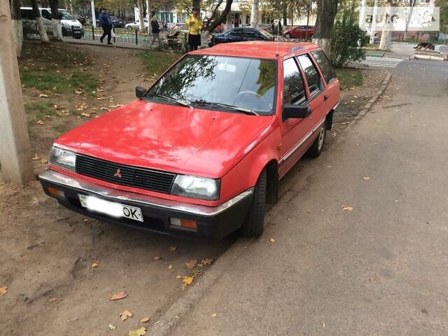 Червоний Міцубісі Lancer, об'ємом двигуна 1.8 л та пробігом 265 тис. км за 1800 $, фото 1 на Automoto.ua