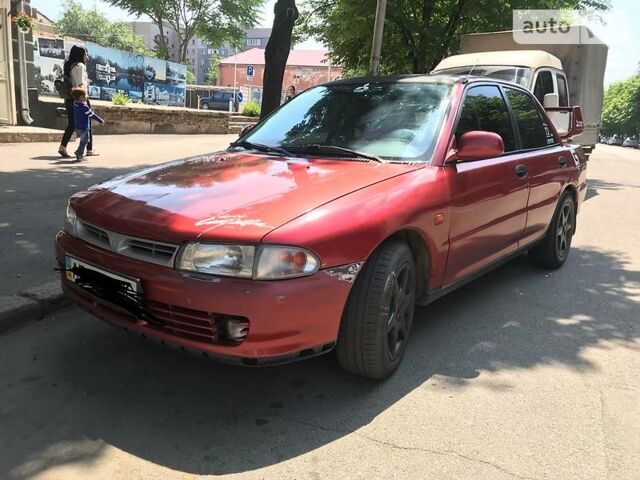 Червоний Міцубісі Lancer, об'ємом двигуна 1.6 л та пробігом 421 тис. км за 2500 $, фото 1 на Automoto.ua