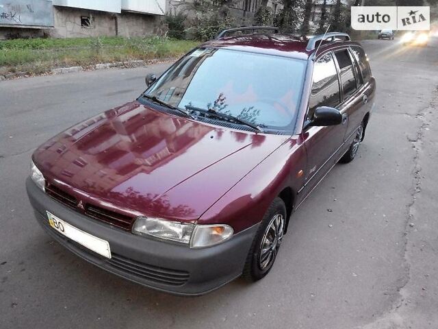 Червоний Міцубісі Lancer, об'ємом двигуна 1.6 л та пробігом 300 тис. км за 2500 $, фото 1 на Automoto.ua