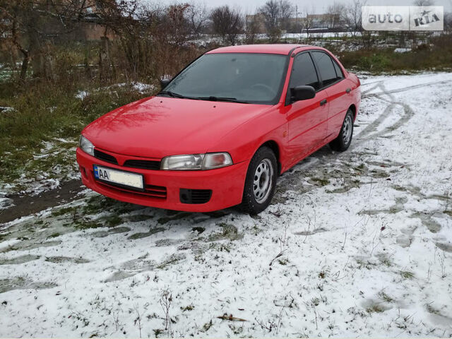 Червоний Міцубісі Lancer, об'ємом двигуна 1.3 л та пробігом 217 тис. км за 3500 $, фото 1 на Automoto.ua