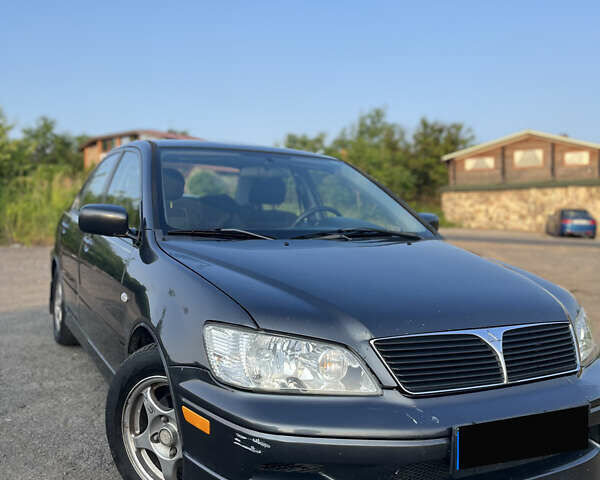 Міцубісі Lancer, об'ємом двигуна 2 л та пробігом 290 тис. км за 4500 $, фото 1 на Automoto.ua