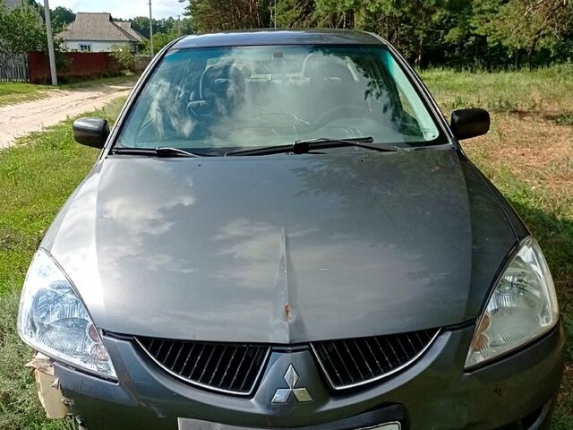 Мицубиси Лансер, объемом двигателя 1.6 л и пробегом 256 тыс. км за 1500 $, фото 1 на Automoto.ua