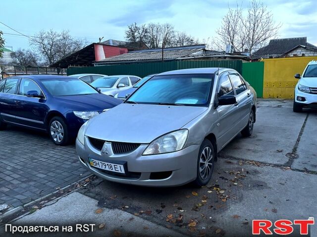 Мицубиси Лансер, объемом двигателя 1.3 л и пробегом 230 тыс. км за 2800 $, фото 1 на Automoto.ua