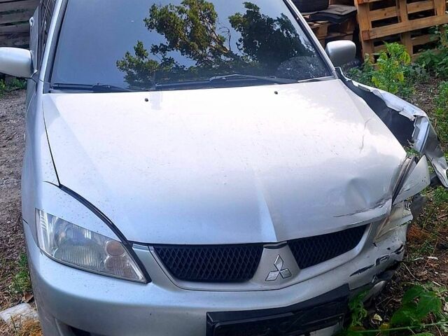 Міцубісі Lancer, об'ємом двигуна 1.6 л та пробігом 240 тис. км за 2300 $, фото 1 на Automoto.ua