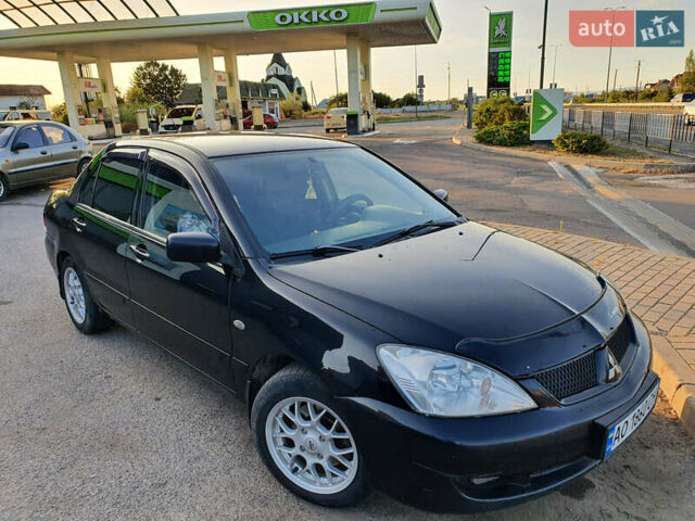 Мицубиси Лансер 2006 в Ужгороде на Automoto.ua Мицубиси Лансер, объемом двигателя 1.6 л и пробегом 320 тыс. км за 3200 $, фото 1 на Automoto.ua