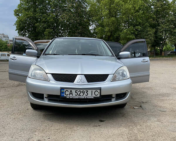 Мицубиси Лансер, объемом двигателя 1.58 л и пробегом 210 тыс. км за 4000 $, фото 1 на Automoto.ua