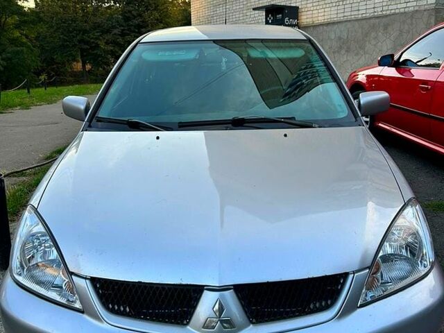 Мицубиси Лансер, объемом двигателя 2 л и пробегом 225 тыс. км за 3000 $, фото 1 на Automoto.ua