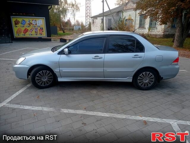 Мицубиси Лансер, объемом двигателя 1.6 л и пробегом 230 тыс. км за 3800 $, фото 1 на Automoto.ua