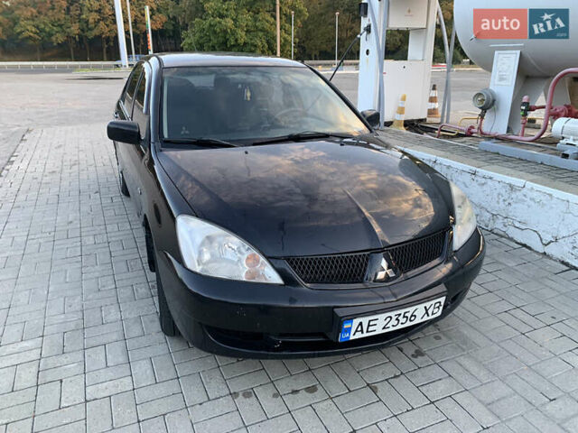 Мицубиси Лансер, объемом двигателя 1.58 л и пробегом 240 тыс. км за 4500 $, фото 1 на Automoto.ua