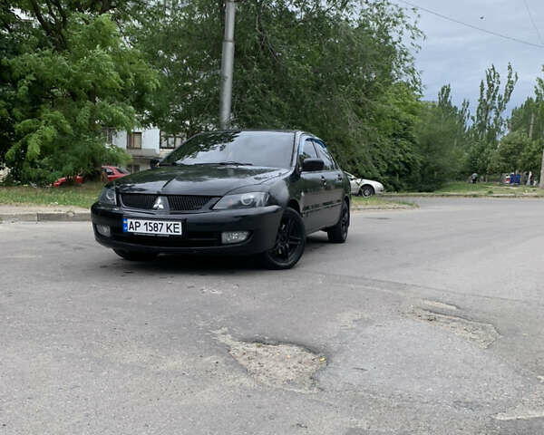 Міцубісі Lancer, об'ємом двигуна 1.58 л та пробігом 210 тис. км за 4300 $, фото 1 на Automoto.ua