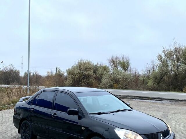 Мицубиси Лансер, объемом двигателя 1.6 л и пробегом 263 тыс. км за 2900 $, фото 1 на Automoto.ua