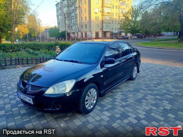 Мицубиси Лансер, объемом двигателя 1.6 л и пробегом 204 тыс. км за 3500 $, фото 1 на Automoto.ua