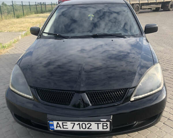 Мицубиси Лансер, объемом двигателя 1.6 л и пробегом 230 тыс. км за 5000 $, фото 1 на Automoto.ua
