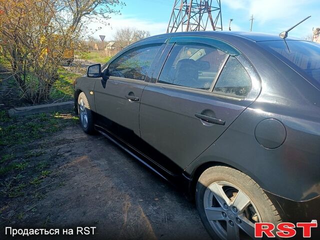 Мицубиси Лансер, объемом двигателя 2 л и пробегом 213 тыс. км за 5300 $, фото 1 на Automoto.ua