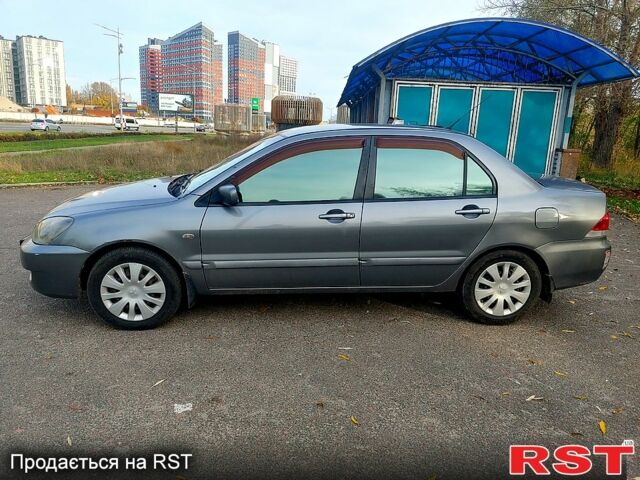 Мицубиси Лансер, объемом двигателя 1.6 л и пробегом 238 тыс. км за 3000 $, фото 1 на Automoto.ua