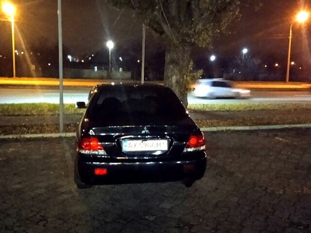 Мицубиси Лансер, объемом двигателя 1.6 л и пробегом 200 тыс. км за 3999 $, фото 1 на Automoto.ua