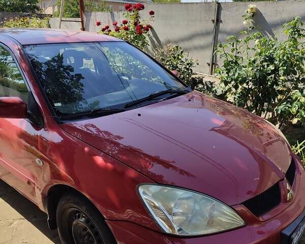 Мицубиси Лансер, объемом двигателя 1.6 л и пробегом 140 тыс. км за 3600 $, фото 1 на Automoto.ua