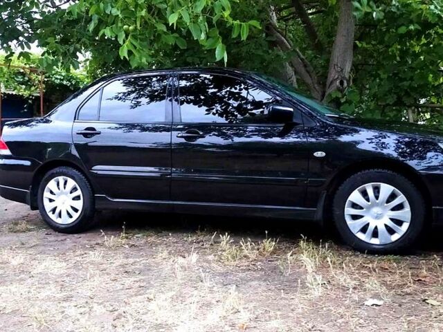 Мицубиси Лансер, объемом двигателя 1.6 л и пробегом 230 тыс. км за 4800 $, фото 1 на Automoto.ua