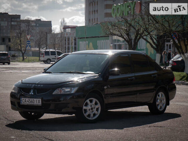 Мицубиси Лансер, объемом двигателя 1.6 л и пробегом 260 тыс. км за 4900 $, фото 1 на Automoto.ua