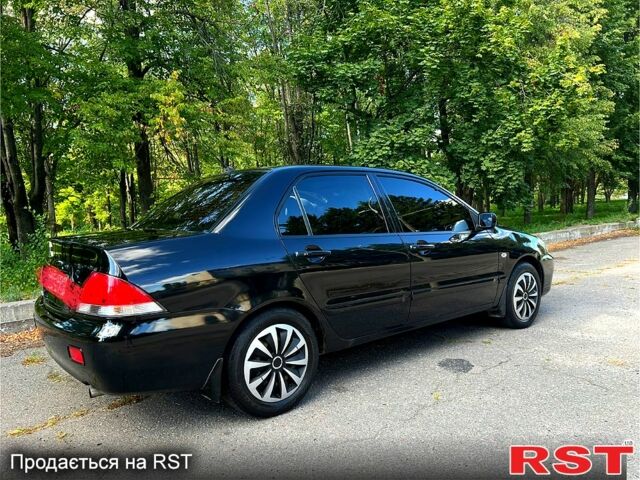 Мицубиси Лансер, объемом двигателя 1.6 л и пробегом 150 тыс. км за 5900 $, фото 1 на Automoto.ua