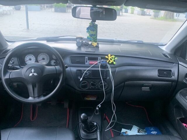 Мицубиси Лансер, объемом двигателя 1.6 л и пробегом 237 тыс. км за 3400 $, фото 1 на Automoto.ua