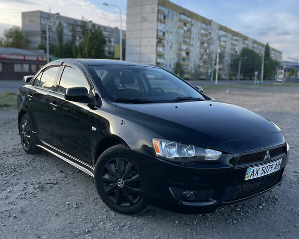 Міцубісі Lancer, об'ємом двигуна 2 л та пробігом 100 тис. км за 7000 $, фото 1 на Automoto.ua