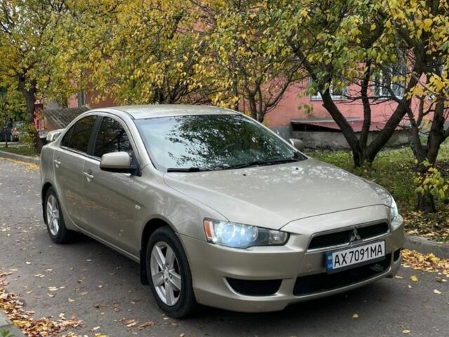 Желтый Мицубиси Лансер, объемом двигателя 1.5 л и пробегом 221 тыс. км за 5300 $, фото 1 на Automoto.ua