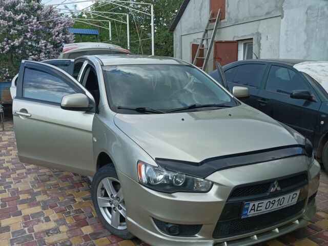 Жовтий Міцубісі Lancer, об'ємом двигуна 2 л та пробігом 136 тис. км за 8300 $, фото 1 на Automoto.ua